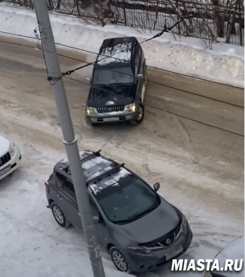 Парковка по-сибирски: мешаешь – на трос и в сторону