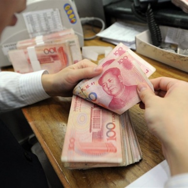 Сбербанк в 2016 году начнет проводить операции в юанях